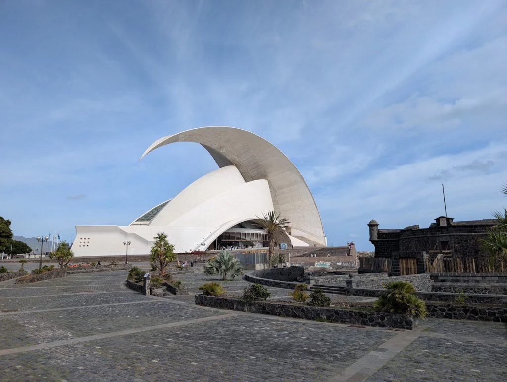 Auditorio de Tenerife designed by Santiago Calatrava next to the black stone Castillo Negro fort in Santa Cruz de Tenerife
