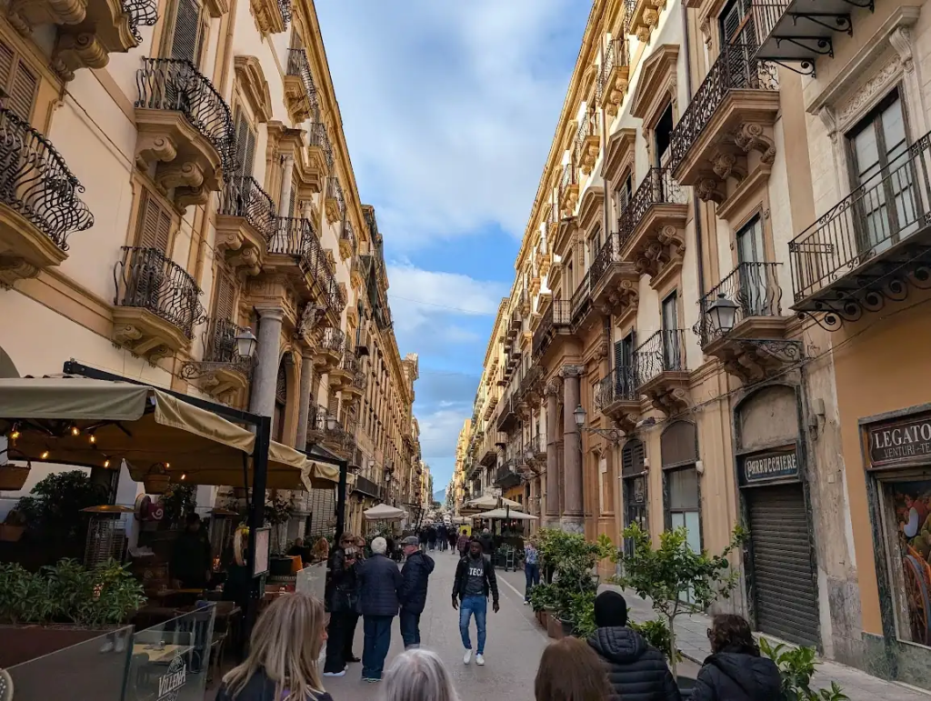 Pedestrian street in the historic centre of Palermo, Sicily, lined with Baroque buildings and cafes