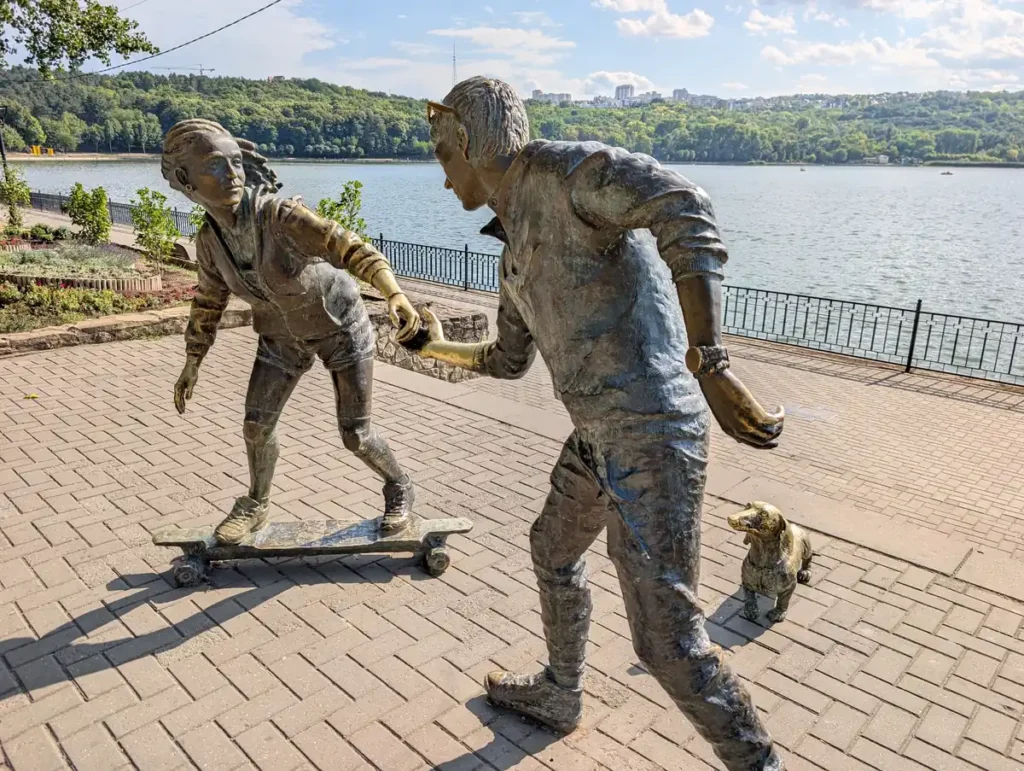 Bronze skateboarding statues at Parcul Valea Morilor lakeside, Chisinau Moldova