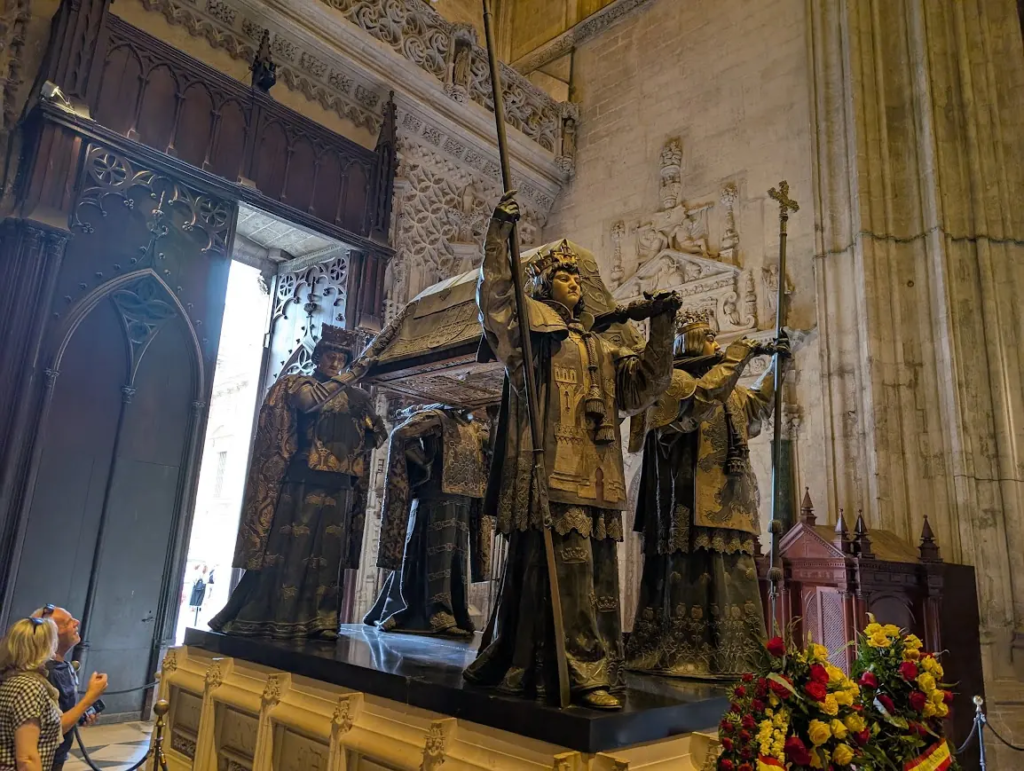 Christopher Columbus tomb carried by royal pallbearers inside Seville Cathedral, Spain