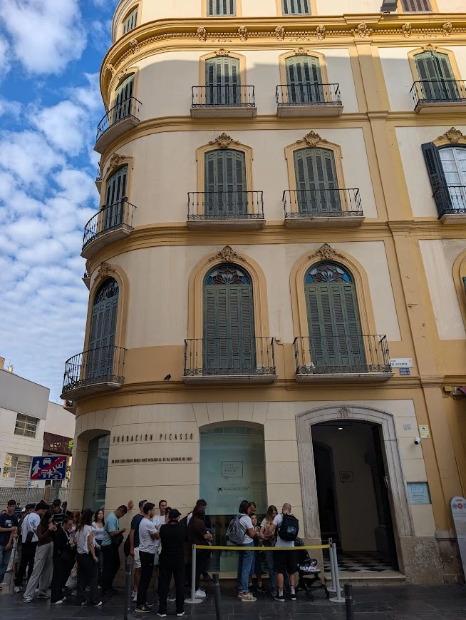 Queue outside Picasso Birthplace Museum in Málaga on a Sunday