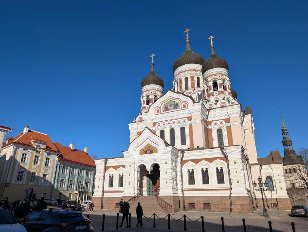 Alexander Nevsky Cathedral in Tallinn, Estonia, with its distinctive onion domes against a blue sky