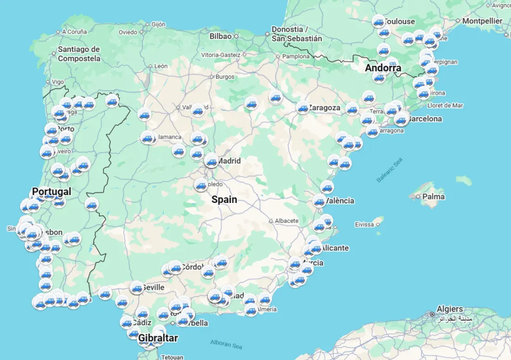 Google Maps screenshot of Portugal, Spain, southern France and Andorra with blue car icons marking every place visited on a 52-day road trip